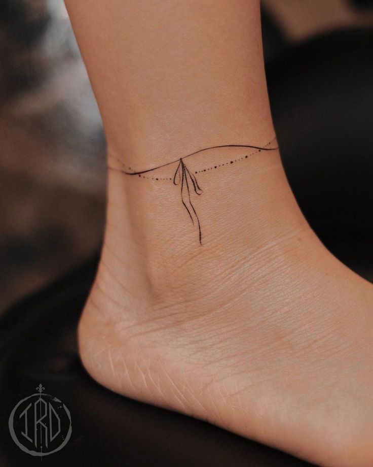 Girly ankle tattoo 14